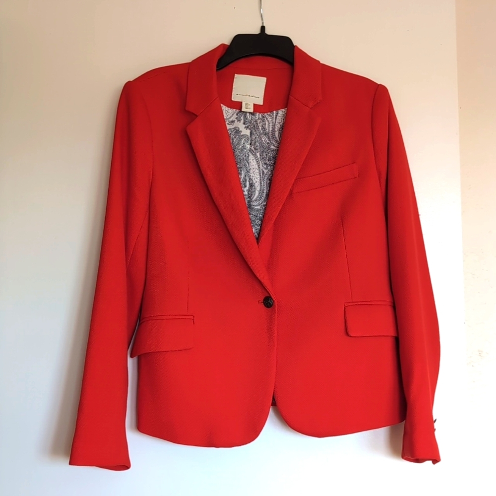 A very vibrant red blazer in size L by Mercer and Madison